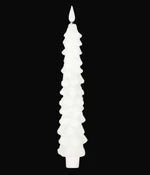 A white Christmas tree-shaped candle with a pointed flame on top, shown against a solid black background.
