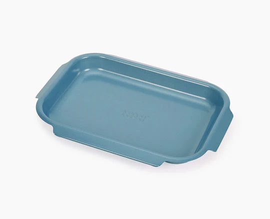 Blue metal baking  tray on a white background