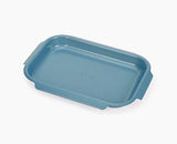 Blue metal baking  tray on a white background