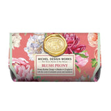 Packaged bar soap with floral design and a label that reads 'Michel Design Works for every room in the house - Sheer pearl and sandalwood'.