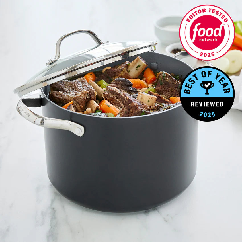 Black pot with food inside on a marble surface, featuring Food Network logos.