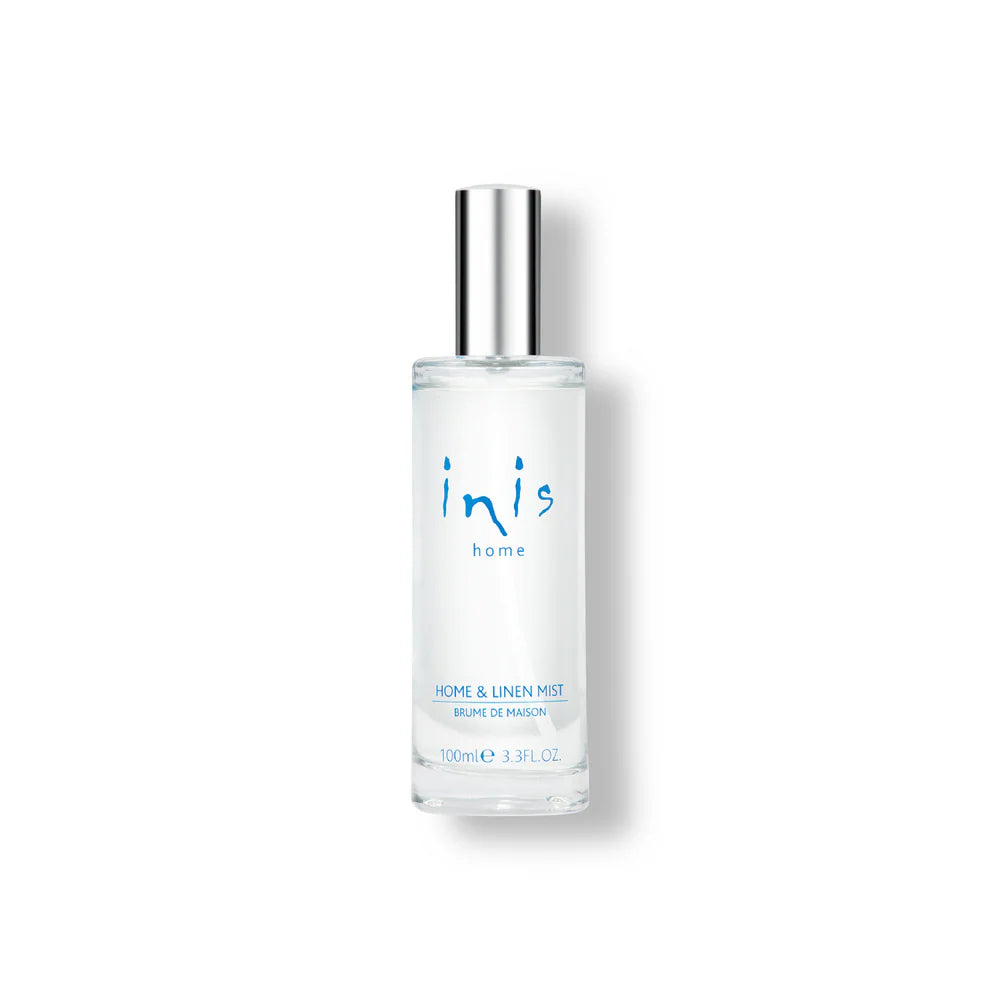 Clear bottle with silver cap labeled 'inis' on a white background