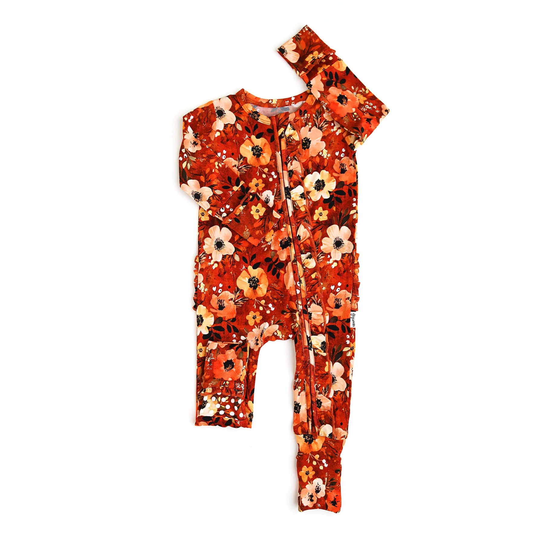 Floral-patterned baby romper on a white background