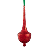 Red glass ornament with a green string on a white background
