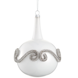 White ornament with silver decorative pattern on a white background