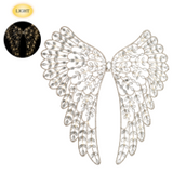 Decorative butterfly wings with a black and white illustration on a white background