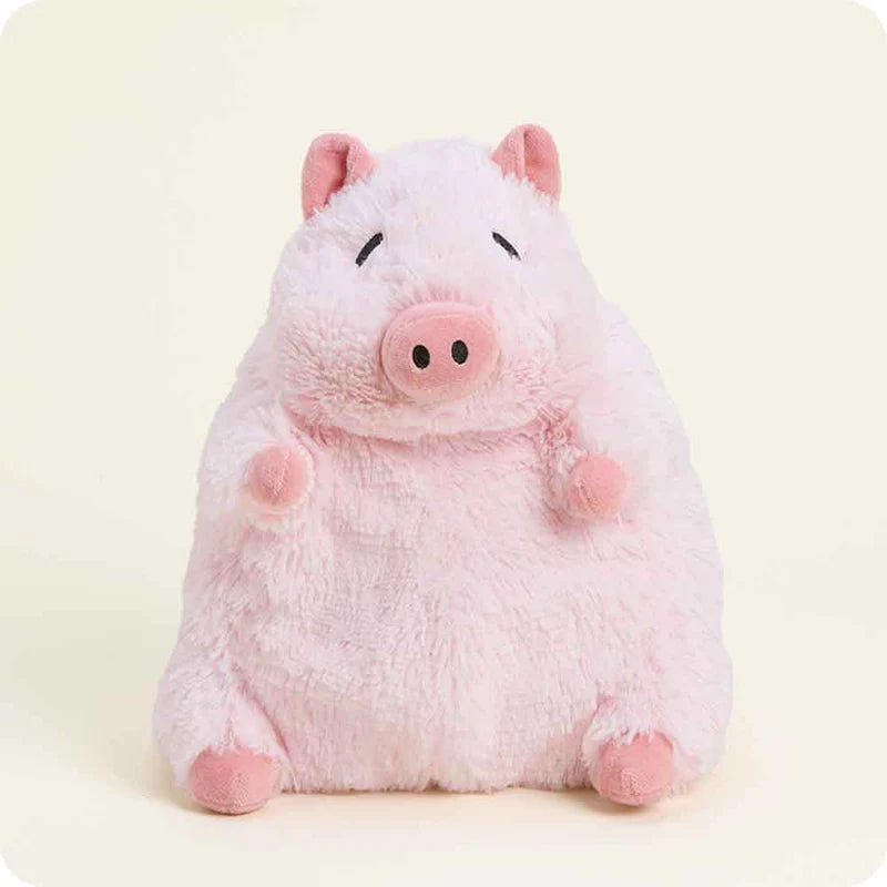Plush pig toy on a light background