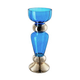 A blue glass candle holder with polished silver-tone metal accents at the neck and base, shown on a plain white background.