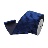 Roll of blue ribbon on a white background