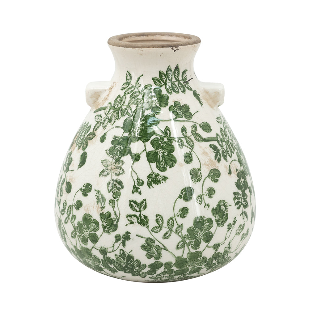 Ceramic vase with green floral pattern on a white background
