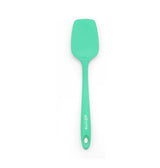 Green spatula with 'ellina' branding on a white background