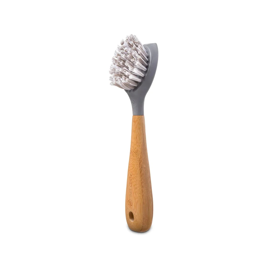 Bottle brush with wooden handle and gray bristle head on a white background