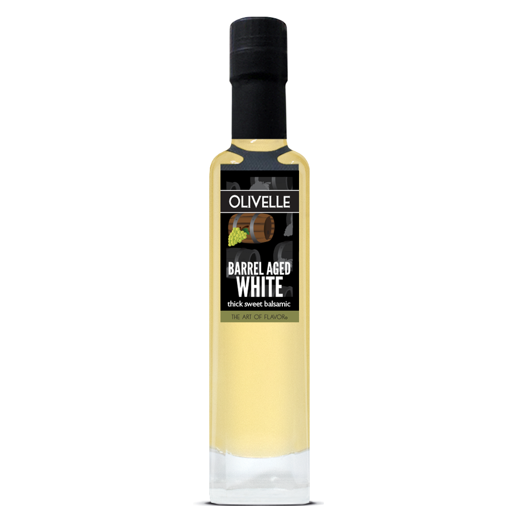 Bottle of Olivelle Barrel Aged White balsamic vinegar on a white background