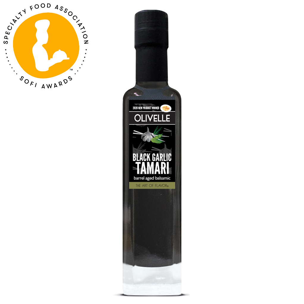 Bottle of Olivelle Black Garlic Tamari with a Specialty Food Association award logo.