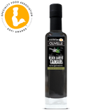 Bottle of Olivelle Black Garlic Tamari with a Specialty Food Association award logo.