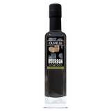 Bottle of Olivelle Bourbon barrel-aged extra virgin olive oil on a white background