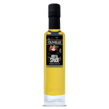 Bottle of Olivelle Fiesta Spice infused olive oil on a white background