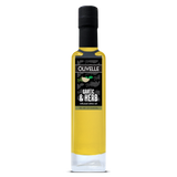 Bottle of Olivelle Garlic & Herb infused olive oil on a white background