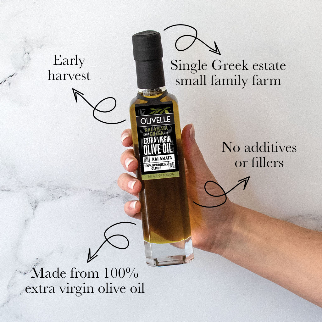 Hand holding a bottle of Olivelle olive oil with text highlighting its features on a marble background.