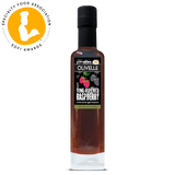 Bottle of Olivelle vine-ripened raspberry vinegar with a Specialty Food Association award logo.