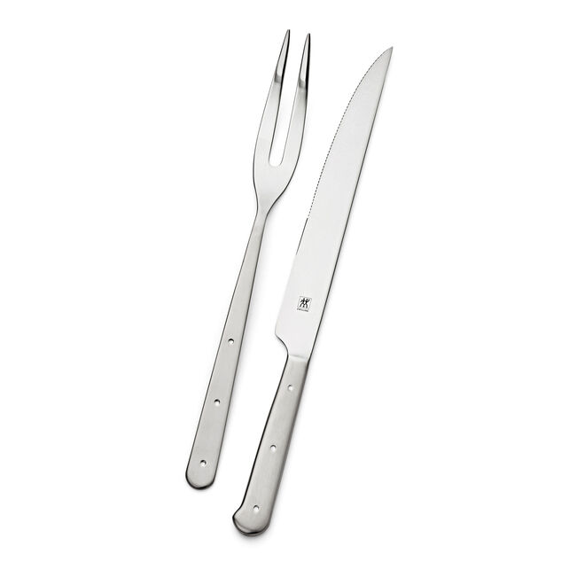 Stainless steel fork and knife set on a white background