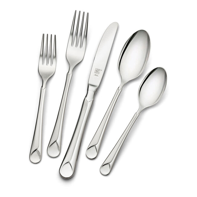 Set of silver cutlery including forks, knives, and spoons on a white background