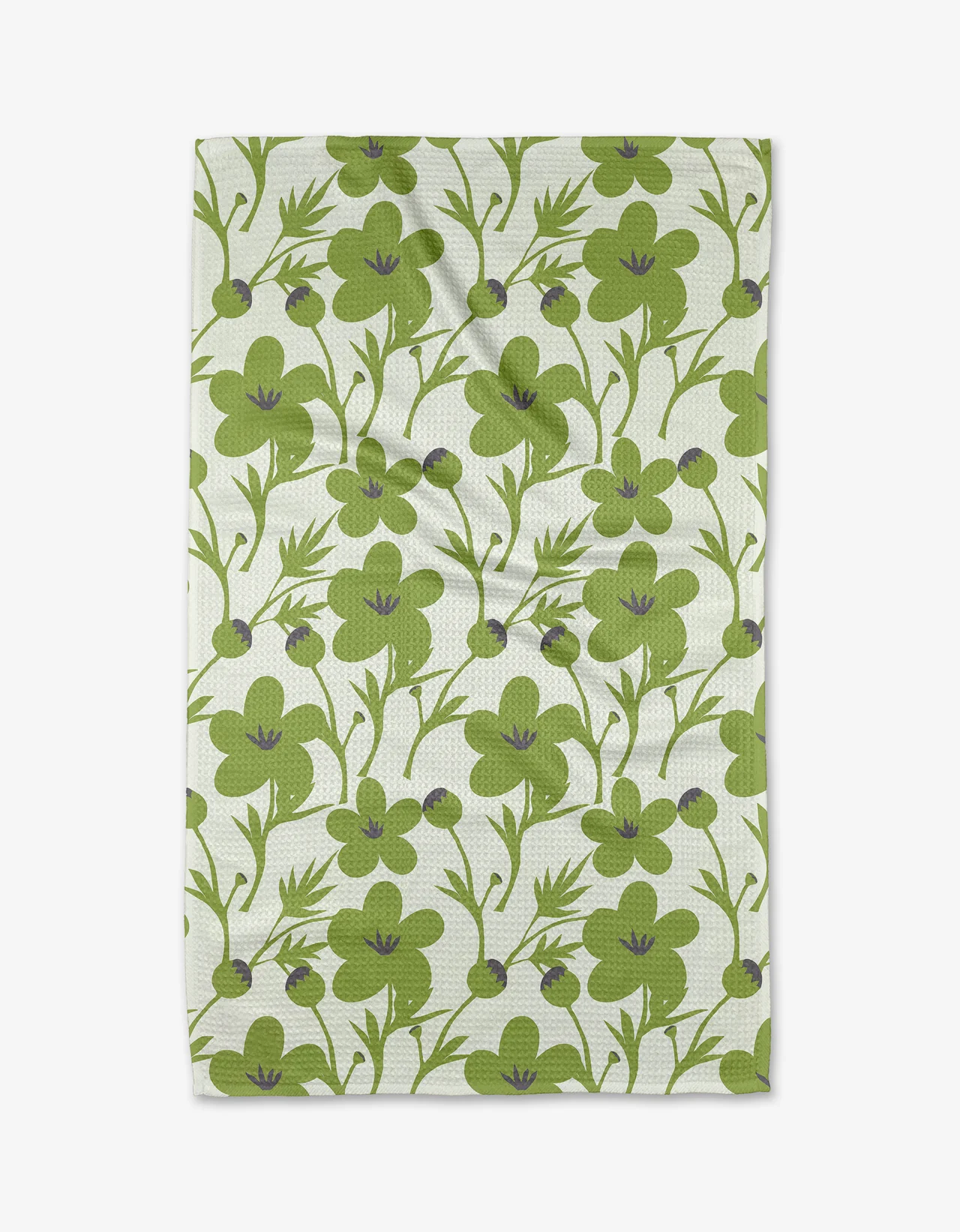 A green and white floral patterned tea towel displayed flat.