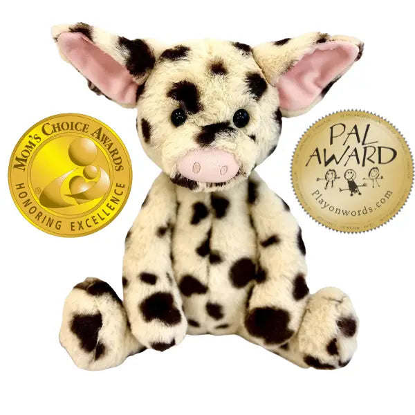 Plush animal toy with awards on a white background