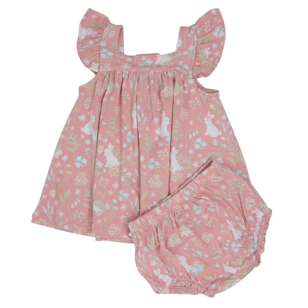 Pink baby dress with ruffled sleeves and matching bloomers on a white background