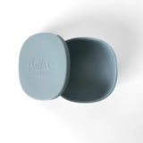 Two blue silicone lids with 'Ollie & Friends' branding on a white background