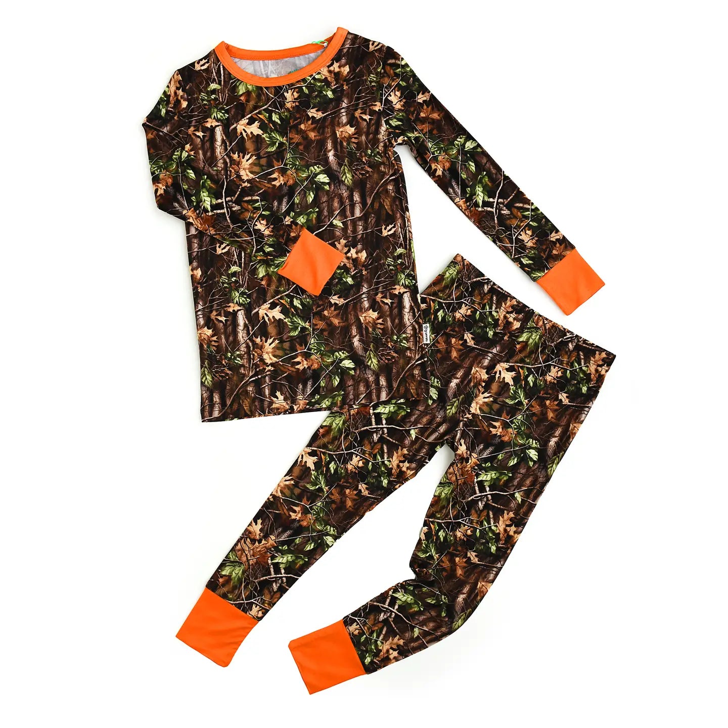 Camouflage pajama set with orange accents on a white background