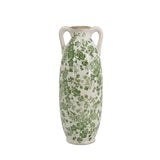Ceramic vase with green floral pattern on a white background