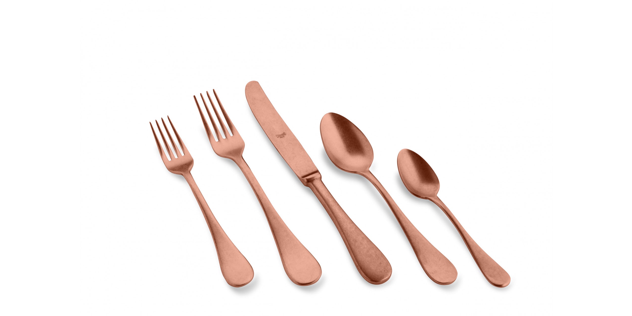 A set of bronze flatware including a dinner fork, dinner knife, soup spoon, and teaspoon, laid out on a white background.