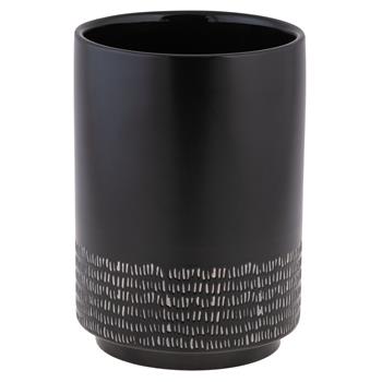 A black cylindrical mason crock with a textured pattern, used for holding kitchen utensils.