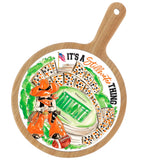 Decorative cutting board with football-themed design and text on a white background