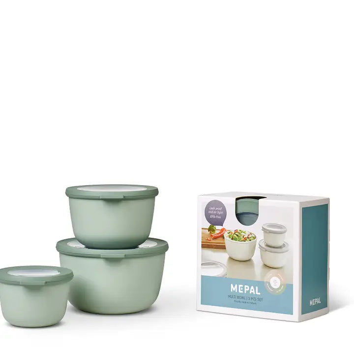 Set of green bowls with a Mepal packaging box on a white background