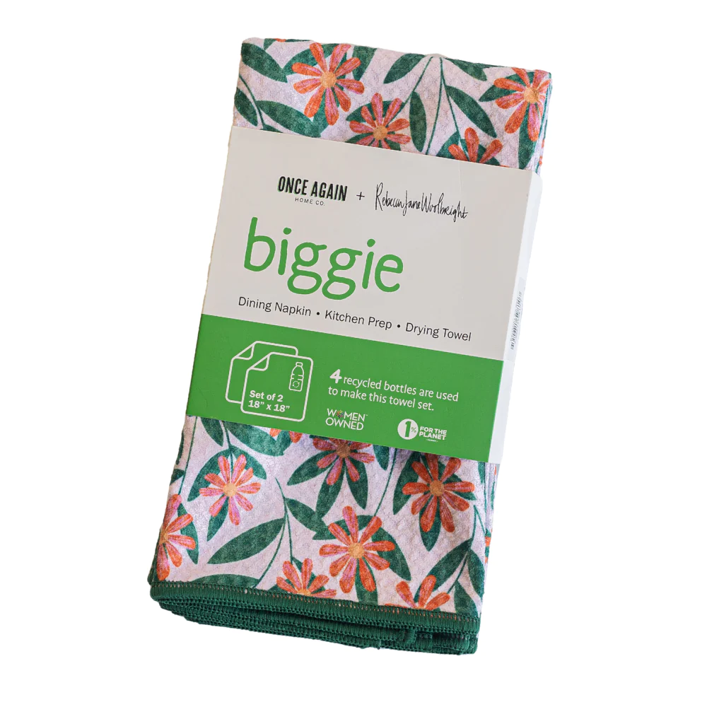 Packaging of Biggie kitchen towels with floral design on a white background, indicating the towels are made from recycled bottles and are quick-drying.