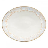 An oval-shaped serving platter with a white base color and blue-grey textured pattern around the edge.