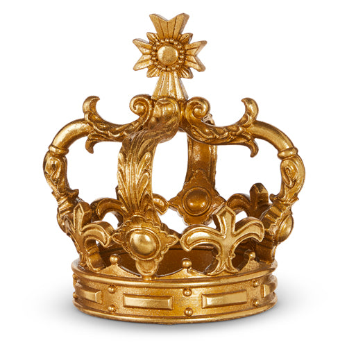 A golden-colored crown with intricate designs and a cross at the top.