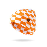 Orange and white checkered beanie with a brown button on a white background