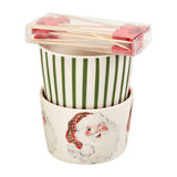 A set of Christmas-themed serving dishes with a Santa Claus design, including a bowl and cups with green striped patterns.