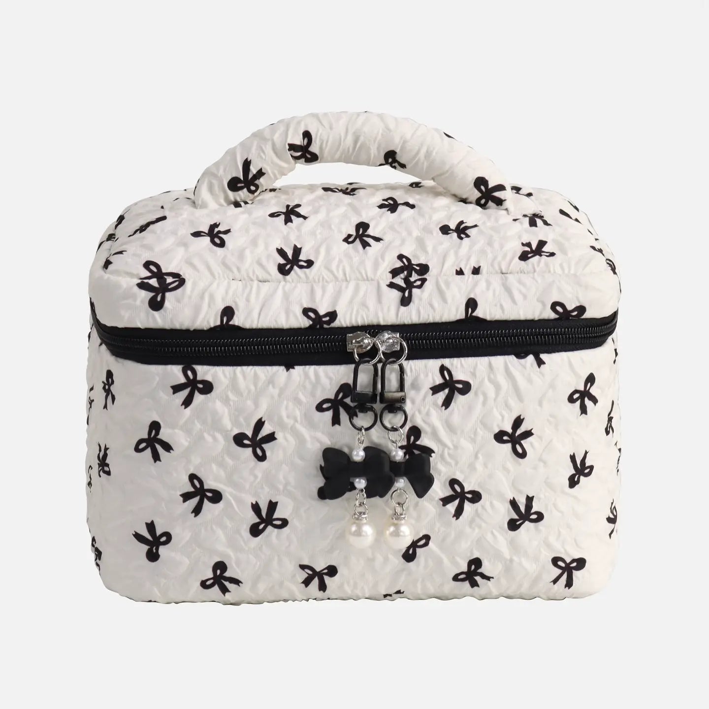 White cosmetic bag with black butterfly patterns on a white background
