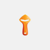 An orange-colored metal orange peeler against a white background.