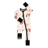 Baby onesie with car pattern and black accents on a white background