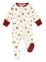 A baby footed sleeper in cream with a baseball pattern and dark red cuffs, collar, and sole.