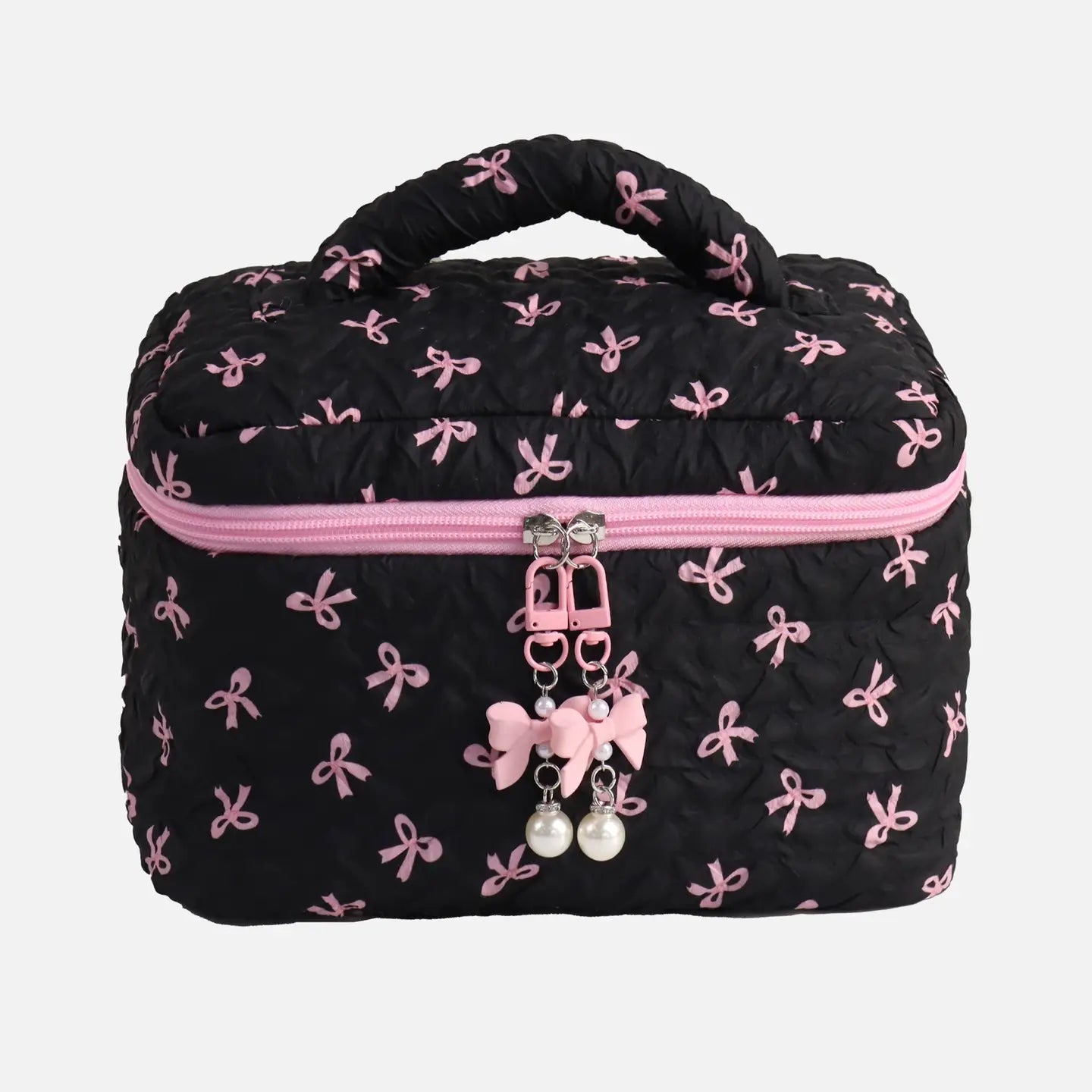 Black makeup bag with pink bow pattern and pink zipper on a white background