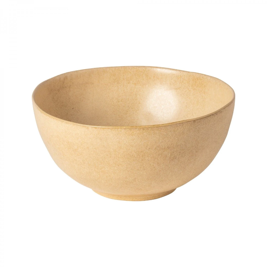 A beige, round serving bowl with a smooth interior.
