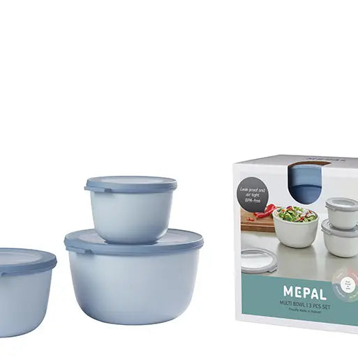Set of blue nesting bowls with a box labeled 'Mepal' on a white background