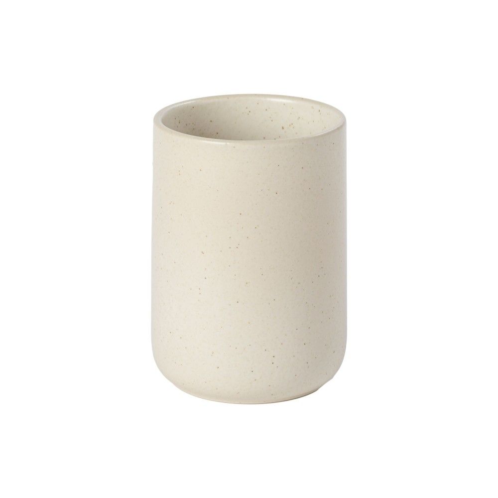 A white ceramic utensil holder with a textured exterior.