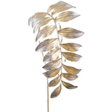 Decorative leaf branch with gold and silver leaves on a white background